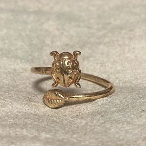The puzzle piece ring is size 5, other two are adjustable!